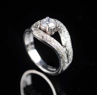 Lot 853 - A diamond dress ring, the brilliant cut...