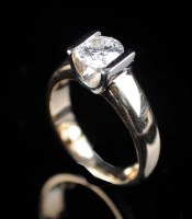 Lot 854 - RETURNED TO VENDOR A single stone diamond ring,...