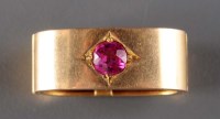 Lot 859 - A synthetic ruby and gold scarf clip, circa...