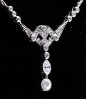 Lot 880 - A diamond necklace, c.1920, the geometric...