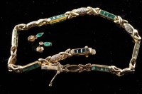 Lot 888 - RETURNED TO VENDOR An emerald and diamond...