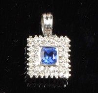 Lot 896 - A tanzanite and diamond pendant, the cushion...