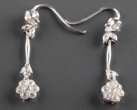 Lot 900 - A pair of diamond earrings, c.1900, the seven...