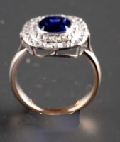 Lot 903 - A sapphire and diamond ring, c.1900, the...