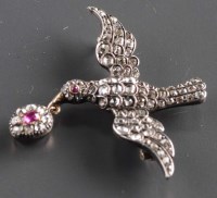 Lot 905 - A ruby and diamond brooch, c.1880, modelled as...