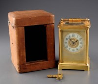 Lot 932 - A brass carriage clock, c.1900, with enamelled...