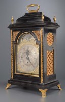 Lot 935 - An ebonised and gilt metal bracket clock, the...