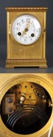 Lot 936 - A gilt metal mantel clock, the painted arabic...