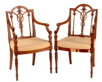 Lot 1002 - A set of six early 20th Century birch carver...