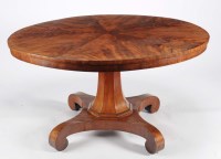 Lot 1003 - A Victorian circular mahogany tip-up-top...