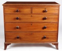 Lot 1014 - A late Georgian mahogany chest of two short...