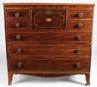 Lot 1018 - A late Georgian mahogany chest of four short...