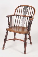 Lot 1022 - A Windsor style armchair with ornate pierced...