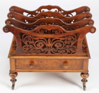 Lot 1026 - A Victorian walnut three-section Canterbury...