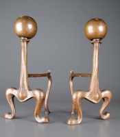 Lot 1038 - A pair of copper Arts and Crafts fire dogs,...