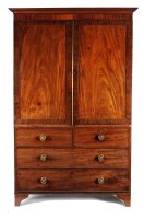 Lot 1056 - A George III mahogany linen press converted to...