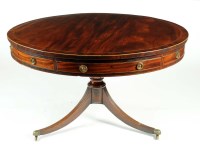 Lot 1068 - A late Georgian circular mahogany drum table,...