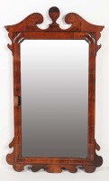 Lot 1069 - A mid 18th Century walnut veneered wall mirror,...