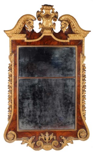 Lot 1073 - A fine walnut and parcel gilt wall mirror with...