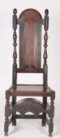 Lot 1087 - A late 17th Century oak high back solid seat...