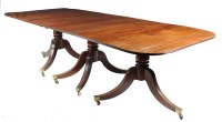 Lot 1090 - A Georgian style mahogany three-stalk dining...