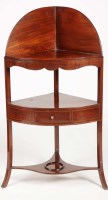 Lot 1104 - A Georgian mahogany corner washstand with...