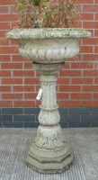 Lot 1124 - A composition garden planter, with egg and...