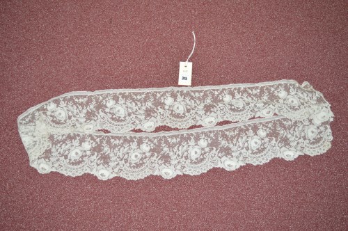 Lot 315 - A 19th Century Brussels needlelace panel,...