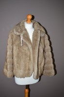 Lot 357 - A 1940's style pale brown faux fur jacket, by...