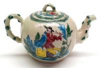 Lot 33 - A salt glaze teapot, c.1760, decorated with a...