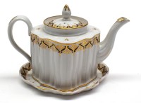 Lot 39 - Factory X commode-shaped hard paste teapot,...