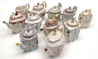 Lot 73 - A collection of teapots, by Factory X, Factory...