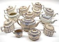 Lot 74 - A collection of smeaglaze teapots, to include:...
