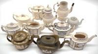 Lot 75 - A quantity of smeaglaze teapots and others, to...