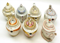 Lot 93 - Oval hard paste teapots, by Factory X; Thomas...