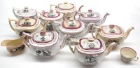 Lot 94 - Black printed and pink lustre teapots, two...