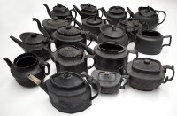 Lot 100 - A 19th Century basalt teapot, by Eastwood...