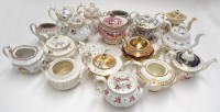 Lot 106 - A collection of various teapots, some without...
