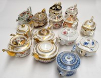 Lot 119 - Fourteen teapots, circular, London form and...