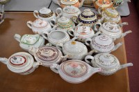 Lot 120 - Sixteen teapots, mainly oval, two on stands,...