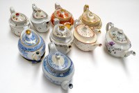 Lot 125 - Nine oval teapots, by Miles Mason; Spode; and...