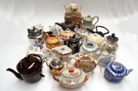 Lot 128 - 19th/20th Century teapots, to include: a...