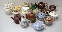 Lot 162 - Bachelor and other small teapots, makers...