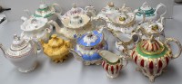 Lot 163 - Eleven footed teapots, 19th Century, one by...