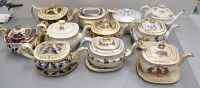 Lot 165 - Eleven teapots of London form, some on stands.