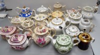 Lot 166 - Eighteen teapots, 19th Century, one on stand...