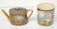 Lot 195 - A Vienna miniature coffee pot of oval form,...