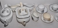 Lot 243 - Tea ware, to include: two teapots; three cream...