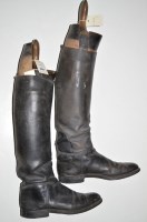 Lot 397 - A pair of black leather riding boots, with...