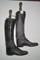 Lot 398 - A pair of black leather riding boots, with...